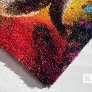 Reklamná rohož JET PRINT LUMA – detail farebného textilného povrchu a rohu rohože