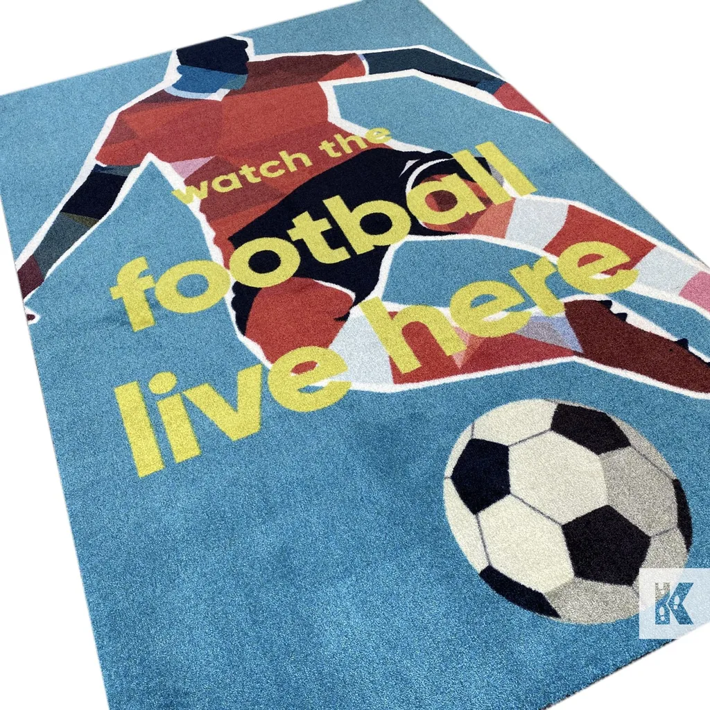 Modrá rohož JET PRINT LUMA s ilustráciou futbalistu, loptou a žltým nápisom