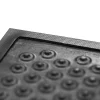 Detail čiernej rohože KLEEN COIL s kruhovými výstupkami a profilovaným okrajom
